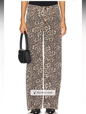 Lioness leopard model Jean in size small. NWT.